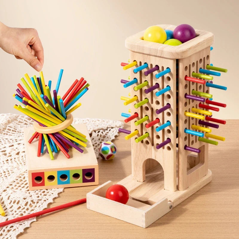 Jeu de tour en bois avec bâtonnets colorés et dé