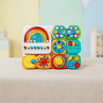 Tableau d’activités sensorielles pour enfant avec attaches et jeux de manipulation
